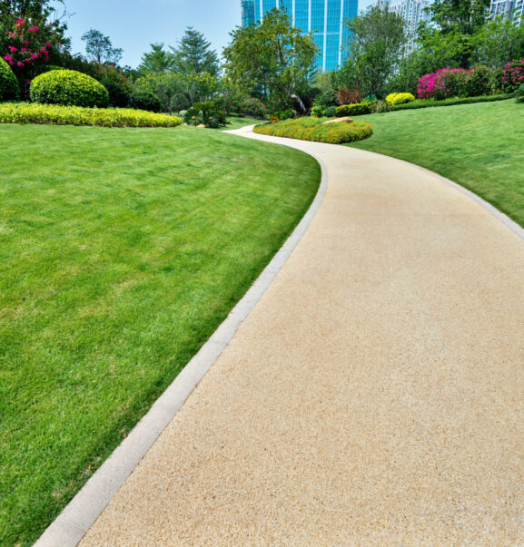 Park near modern office building.
